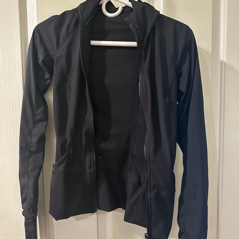 Black Lululemon jacket in perfect condition reversible size 4